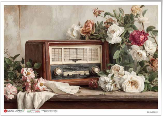 Vintage radio surrounded by flowers on a textured surface