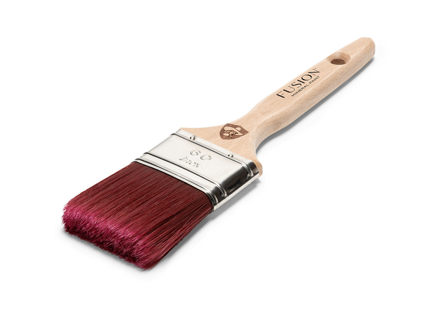 A high-quality flat paintbrush with a natural wood handle and magenta-colored bristles. The metal ferrule secures the bristles to the handle. The brand is Staalmeester.