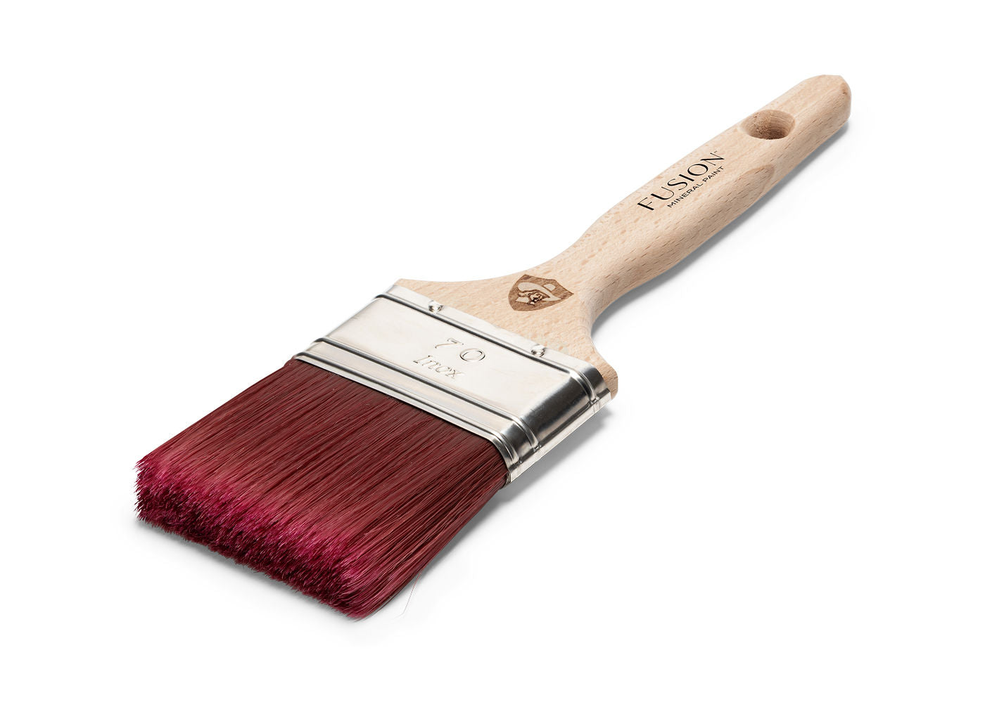 A high-quality flat paintbrush with a natural wood handle and magenta-colored bristles. The metal ferrule secures the bristles to the handle. The brand is Staalmeester.